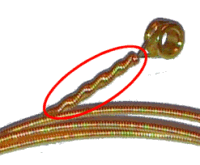 The windings on wound guitar strings go all the way to the end of the string, which can make them hard to fit into the slots on the anchor bar of 'Type A' autoharps.  Click for bigger picture