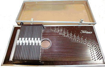The most common briefcase autoharp, the 15-chord Oscar Schmidt 'Educator.' Click for bigger picture