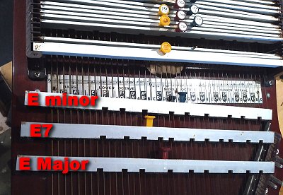 The Caroler's chord bars have deep notches in the aluminum itself. Click for bigger picture.