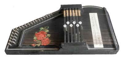 A pre-war Hopf-built autoharp, identifiable only through the Hopf family's iconic rose decal.  Click for bigger picture.