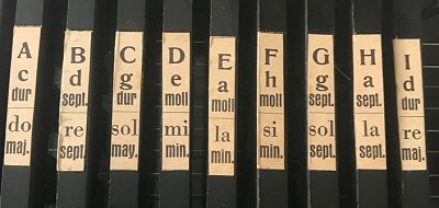 The chord names on the Hopf 9-chord autoharp.  Click for bigger photo.