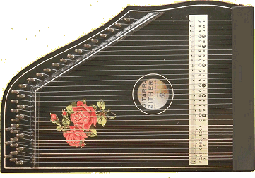 This Hopf-built 'Rosen' was made in Bavaria sometime before 1972, when the GDR forced the Hopf family to stop using their iconic rose decals.  Though it only has three chords, you can learn the basics on zithers of this class. Click for bigger picture.